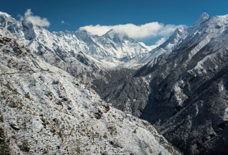 Everest Base - snow mountain with few white clouds