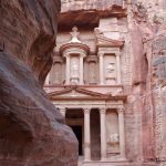 Ancient Petra - a building built into the side of a cliff