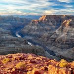 Grand Canyon - brown rocky mountain under white clouds during daytime