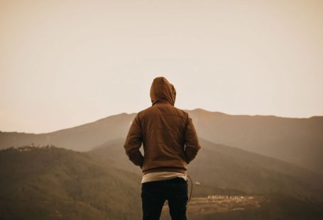 Bhutan Mountains - person wearing brown hoodie