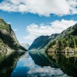 Norway Fjord - body of water near mountain under white clouds