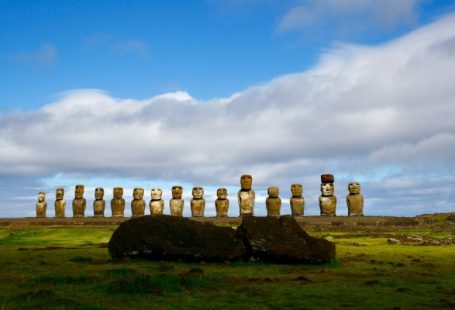 Moai Statues - gray rock formation under white clouds and blue sky during daytime