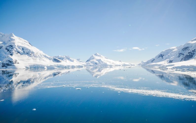 Antarctica Ice - mountain with snow near body of water